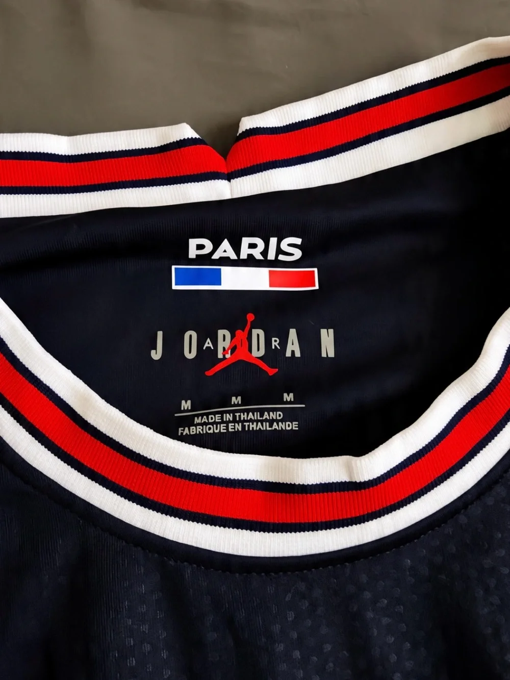 Jordan Navy Blue Paris Saint-Germain Soccer Jersey with Red & White Trim